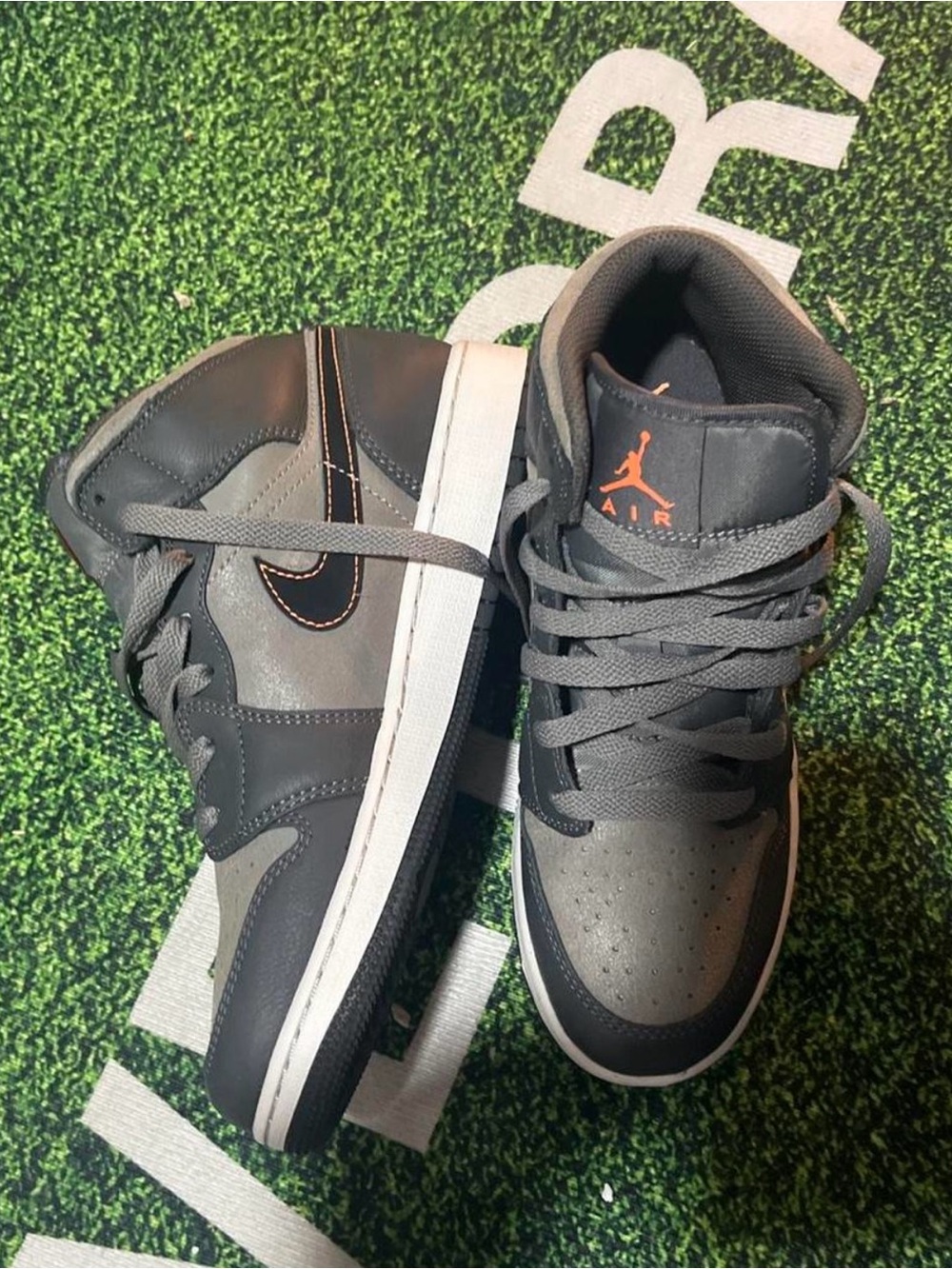 Nike Mid-Top Sneakers in Grey, Black with Orange Accents